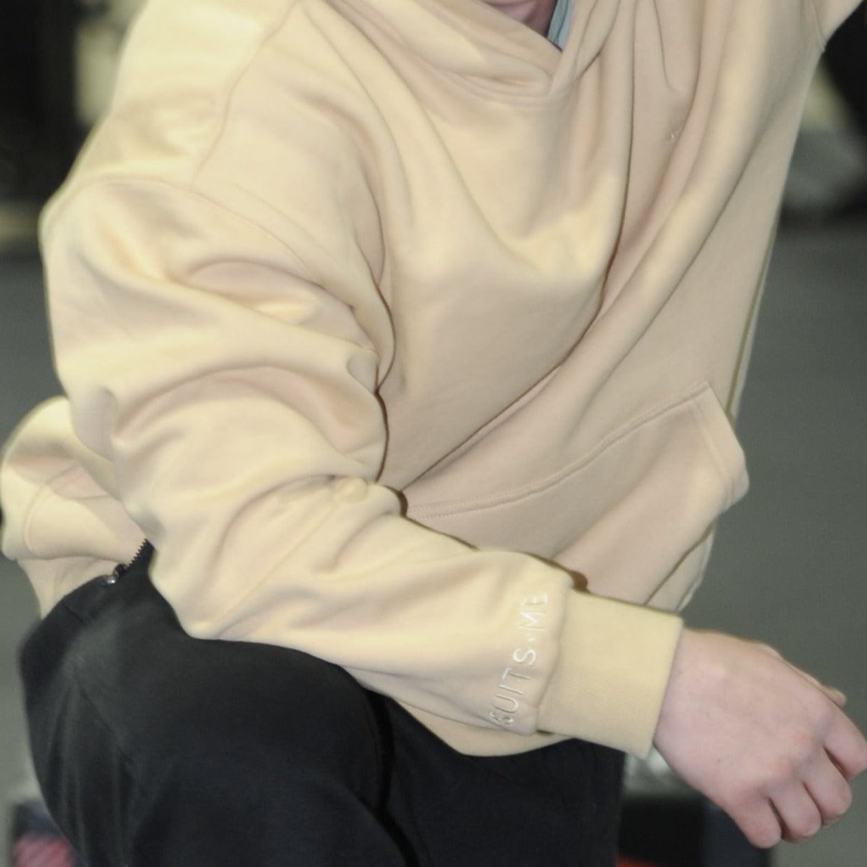 Tan ace hoody close up